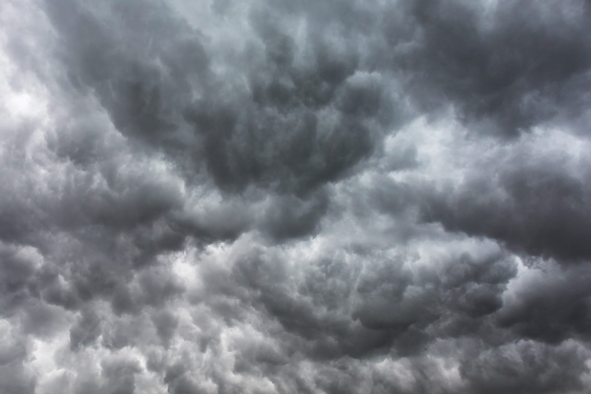 A hero image of dense stormy clouds.
